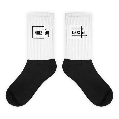 K.O.  Basic logo socks with black cushioned bottom and white ribbed leg portion. Crew length.